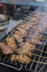 chacoal grilled pork street food thai concept