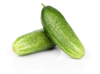 Fresh cucumbers, isolated on a white background