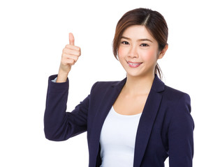 Businesswoman with thumb up