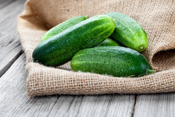 cucumbers on the wooden background