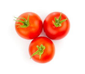 Red tomatoes isolated on a white background.