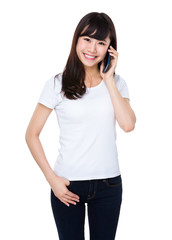 Fototapeta premium Young woman talk to mobile phone