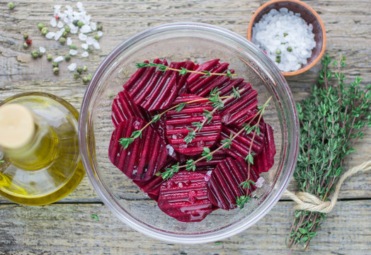 raw beets with olive oil, thyme and sea salt for baking