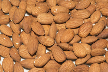 Shelled almonds closeup, background
