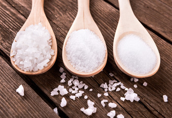 sea salt different grinding in a wooden spoons © Ekaterina Belova