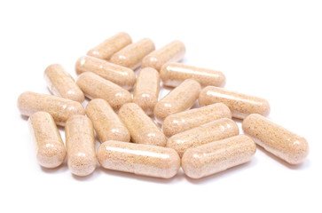 Heap of medicine pills on white background