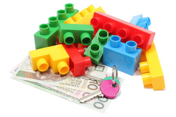 Colorful building blocks for children with home keys and money