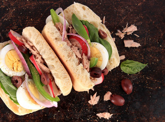 Tuna nicoise sandwich, also known as pan bagnat - 78965898