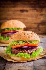 two homemade hamburgers with organic vegetables