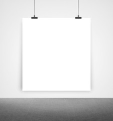 white poster on a wall