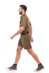 Walking man in khaki uniform