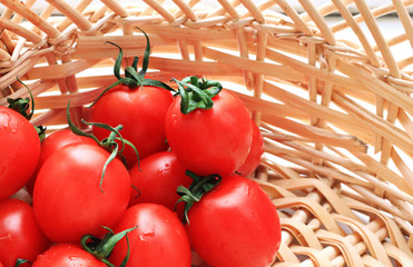 tomatoes in straw basket