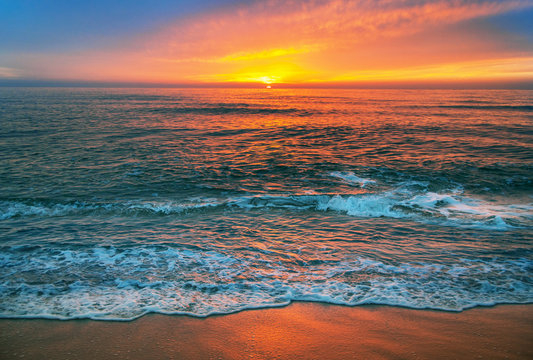 Fototapeta Beautiful cloudscape over the sea, sunrise shot.
