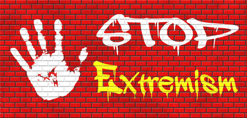 Hand paint with stop extremism graffiti on brick wall