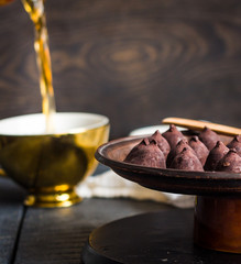 truffle chocolates, pouring coffee into a cup