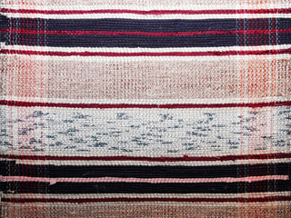 textile background (homespun rug)