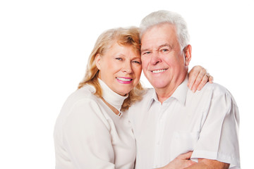 Happy senior loving couple over white background