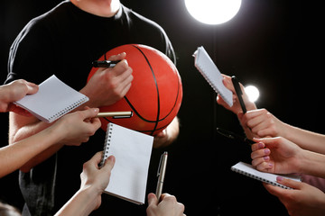 Autographs by basketball star on black and lights background - obrazy, fototapety, plakaty