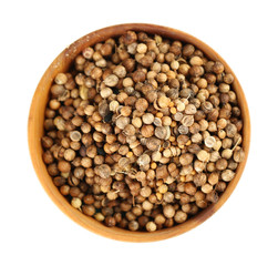 Coriander in wooden bowl, isolated on white