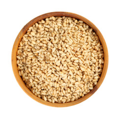 Sesame in wooden bowl, isolated on white