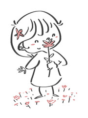 niña oliendo una flor