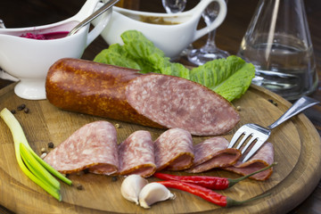 sausage on a wooden plate in a restaurant
