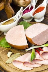 sausage on a wooden plate in a restaurant