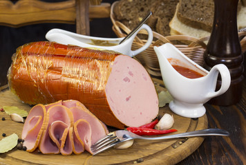 sausage on a wooden plate in a restaurant