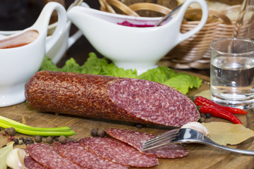 sausage on a wooden plate in a restaurant