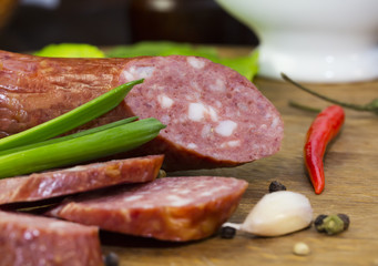 sausage on a wooden plate in a restaurant