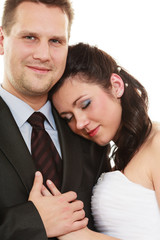 Married couple hugging