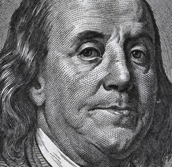 Extreme macro of 100 dollar bill with Benjamin Franklin portrait