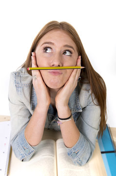 Student Girl Holding Pen Between Nose And Lips As Mustache