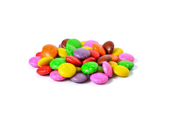 lots of colorful candies spread on white background