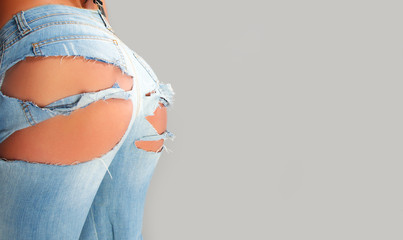 Female buttocks in jeans
