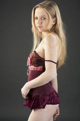 Model poses wearing lingerie