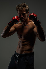 Boxer posing in studio.