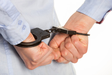 Hands in handcuffs