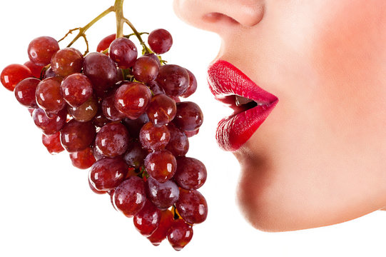 Sexy Woman Eating Red Grapes, Sensual Red Lips