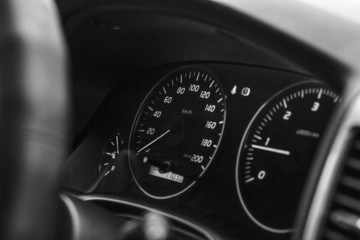 speedometer and dashboard car black and white photography