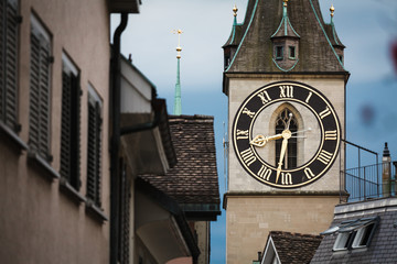 Fototapeta na wymiar Clock tower in Zurich, Switzerland