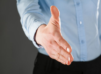 Businesswoman offering handshake