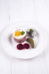 labskaus with fried egg on a plate