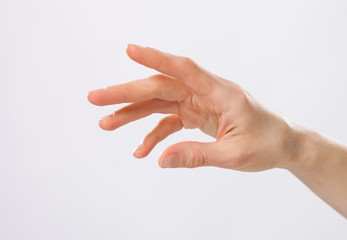 Human hand reaching out for help - closeup shot