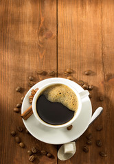 cup of coffee on wood