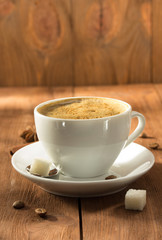 cup of coffee on wood