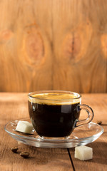 cup of coffee on wood