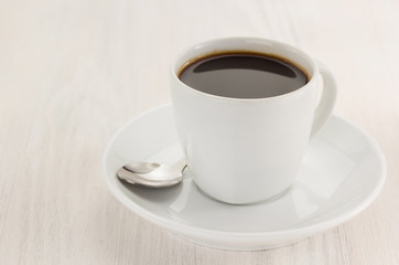 cup of coffee on wood