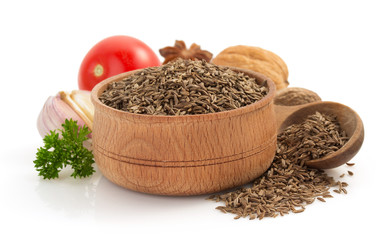 cumin seeds on white background