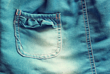 Detail of blue jeans skirt 